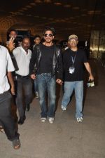 Shahrukh Khan with son snapped at airport in Mumbai on 25th Aug 2014